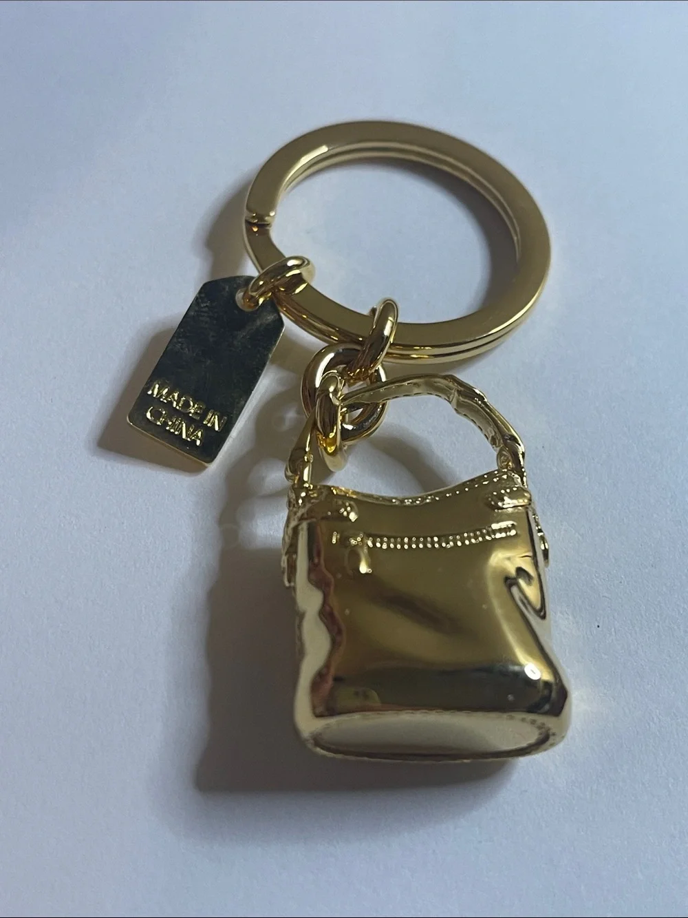 Coach Gold Mini Bleecker Bag Keychain Charm and Coach Pen